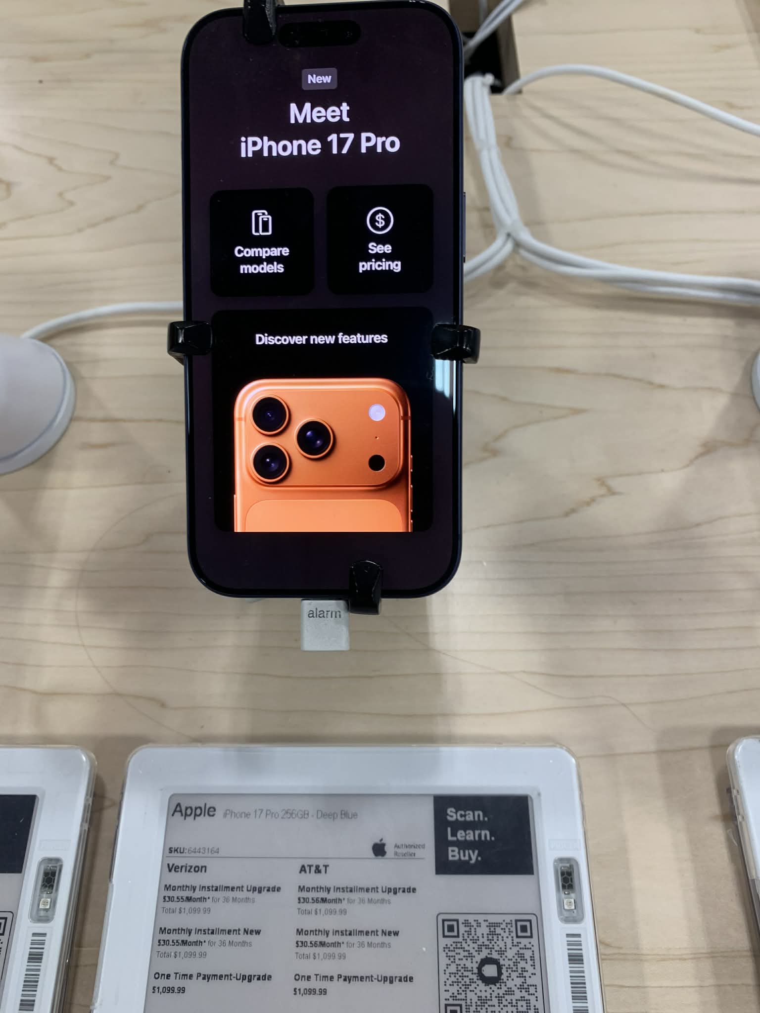 iPhone 17 Pro showcasing redesigned titanium frame, advanced camera system, and edge-to-edge OLED display