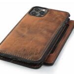 Premium leather iPhone 17 case showing rich patina development with natural grain texture